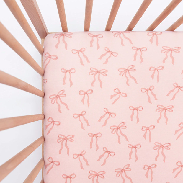 Brave Little Ones Coquette Bows Crib Sheet.