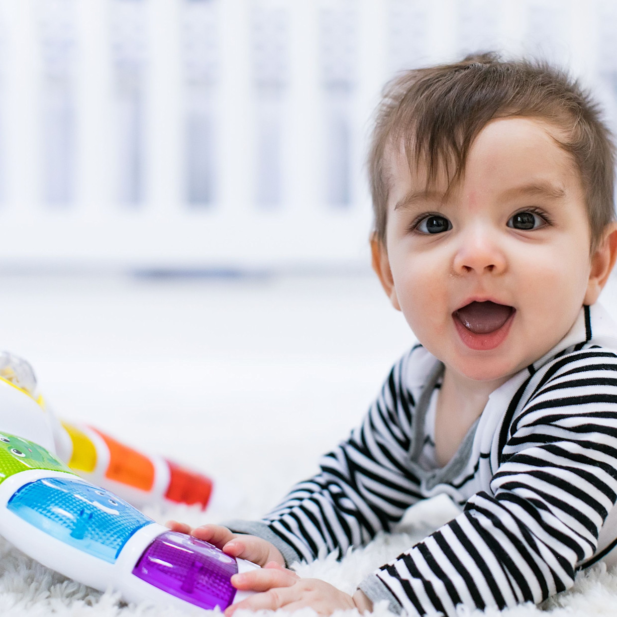 Baby Einstein Glow & Discover Light Bar Tummy Time Toy.