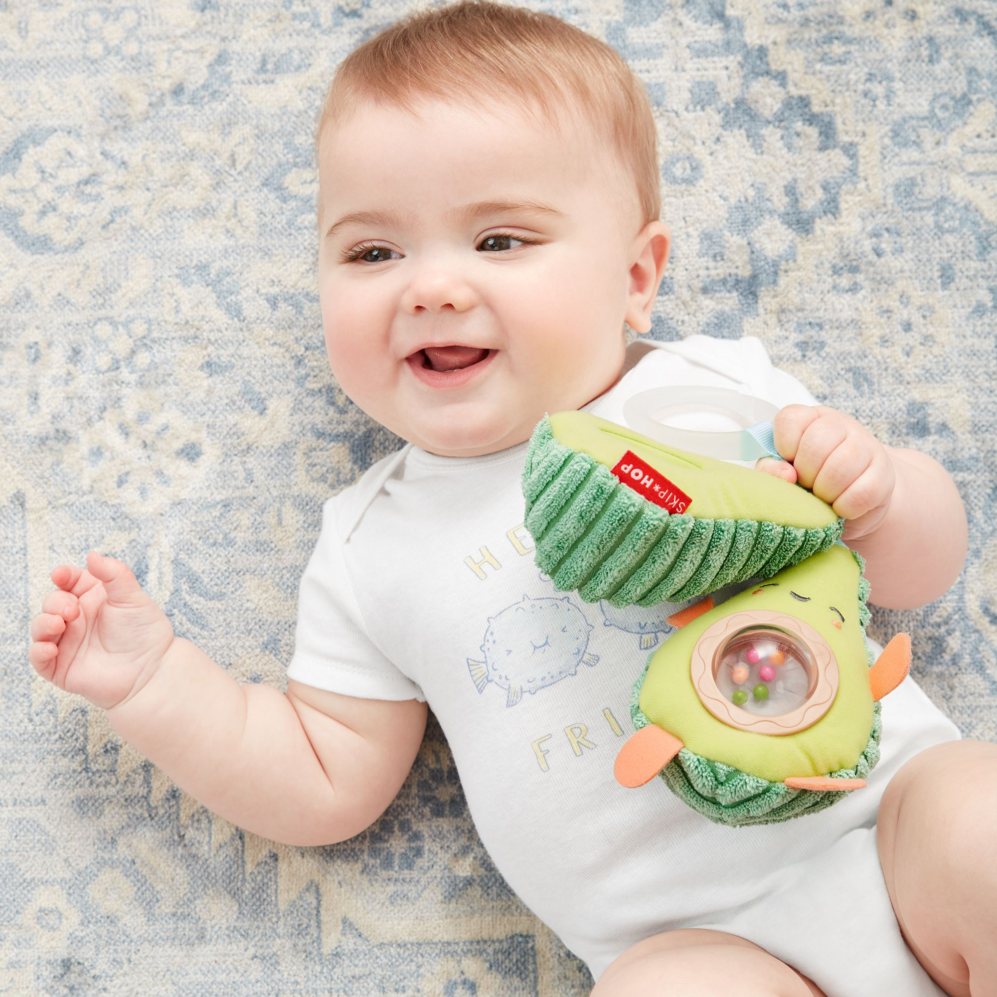 Skip Hop Farmstand Avocado Stroller Toy.
