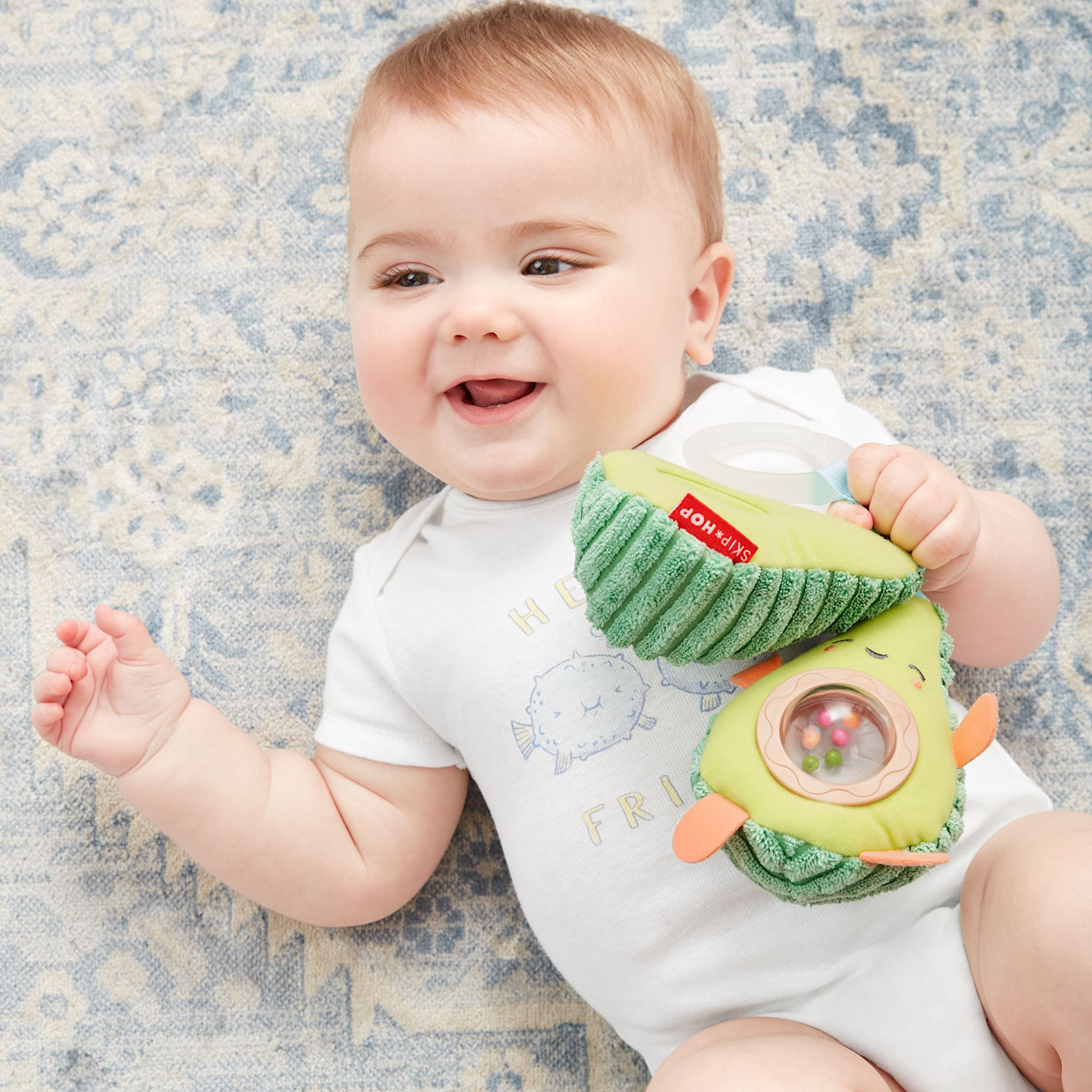 Skip Hop Farmstand Avocado Stroller Toy.