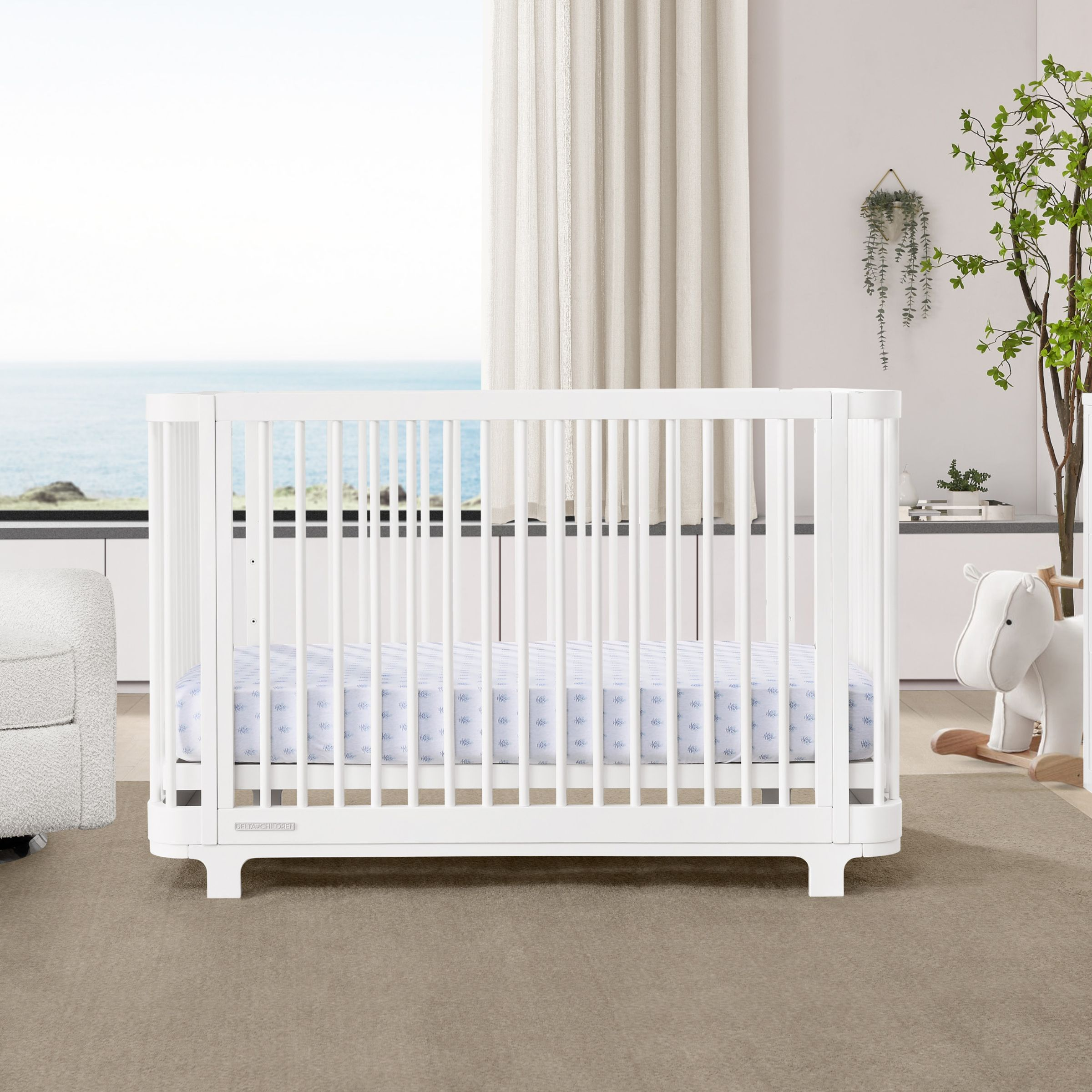 Delta Children Nest 4-in-1 Convertible Crib.