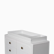 White dresser with changing topper and open shelf on top