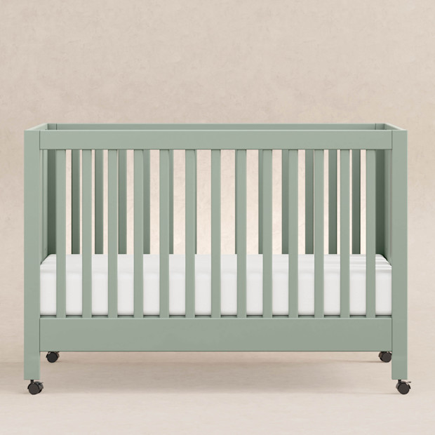 babyletto Maki Portable Folding Crib with Toddler Bed Conversion Kit.