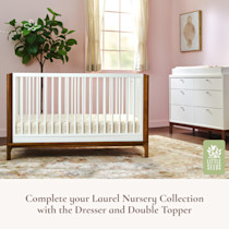Laurel Nursery crib with dresser in a pink room, Little Seeds logo
