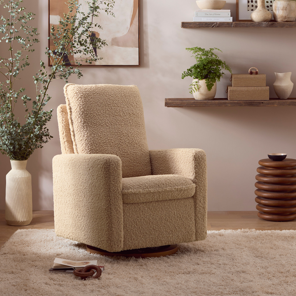 babyletto Cali Pillowback Swivel Glider - Chai Shearling With Dark Wood Base.