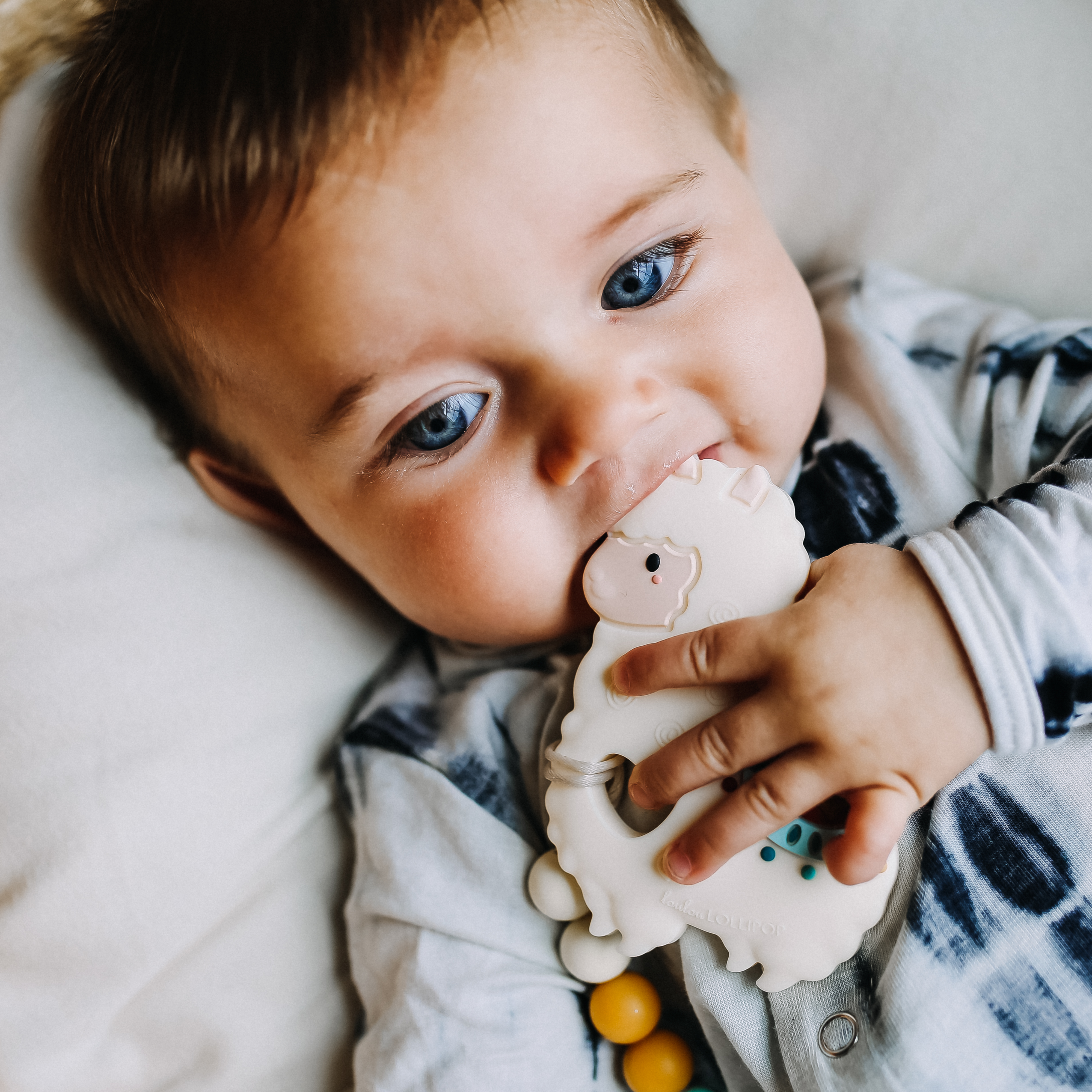 Loulou Lollipop Silicone Teether with Metal Clip.