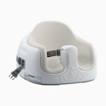 Bumbo Multi Seat in White Sand/White, side view with restraint