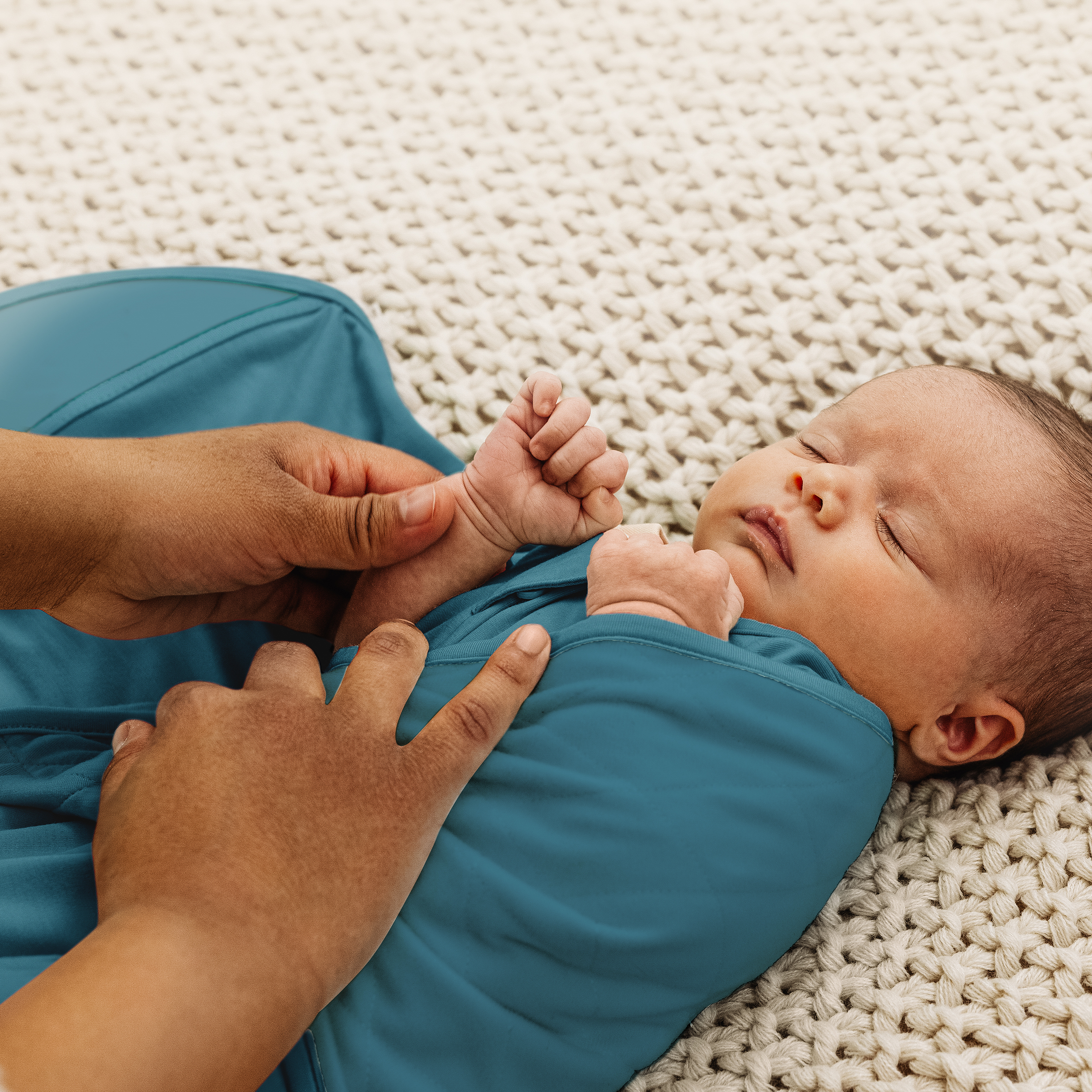 owlet sock while swaddled