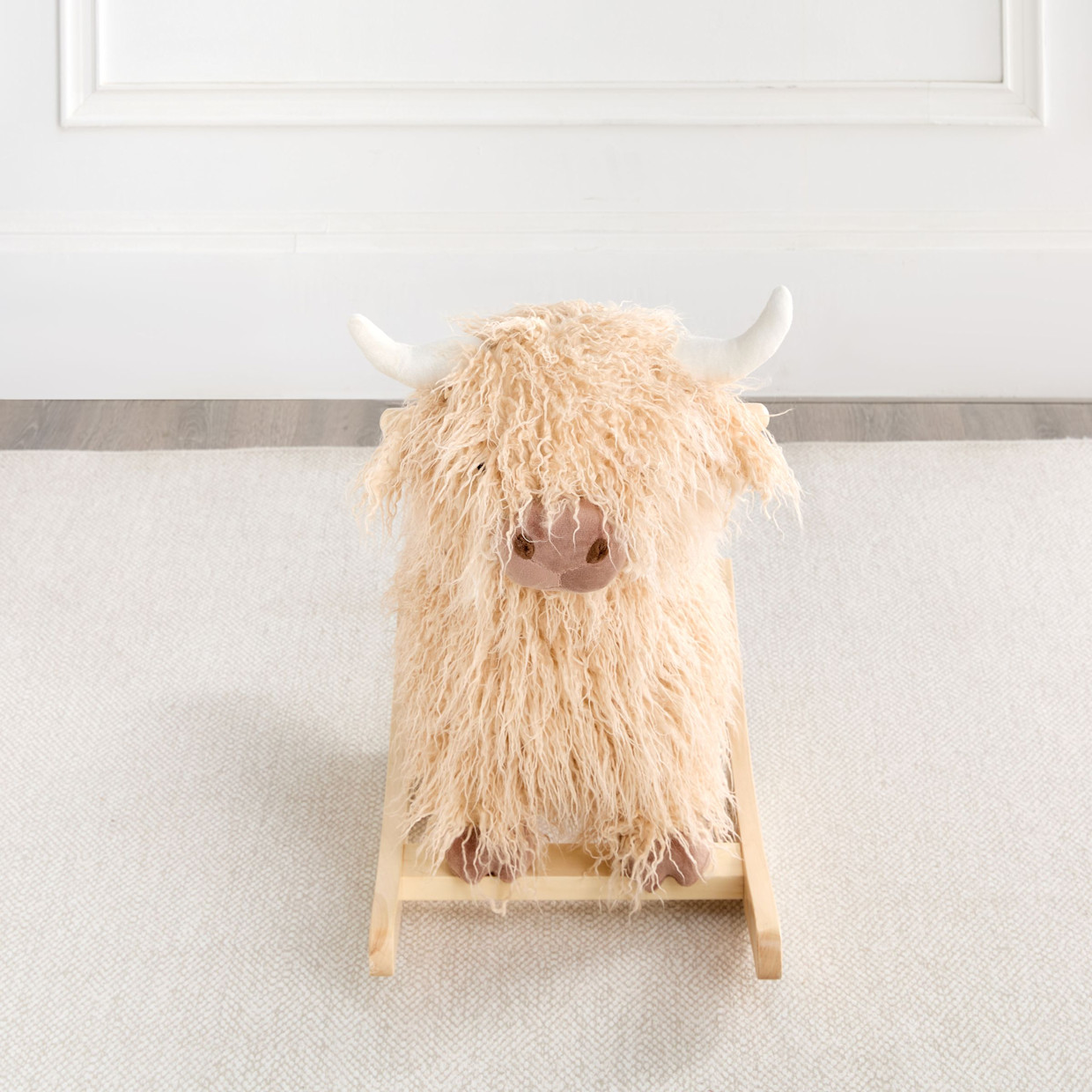 Wonder & Wise Highland Cow Rocker.