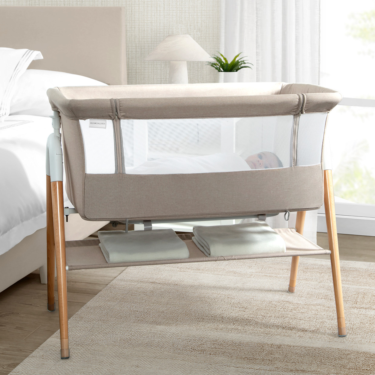 Delta Children Bondi Adjustable Height Bedside Beechwood Bassinet - Tan Melange.