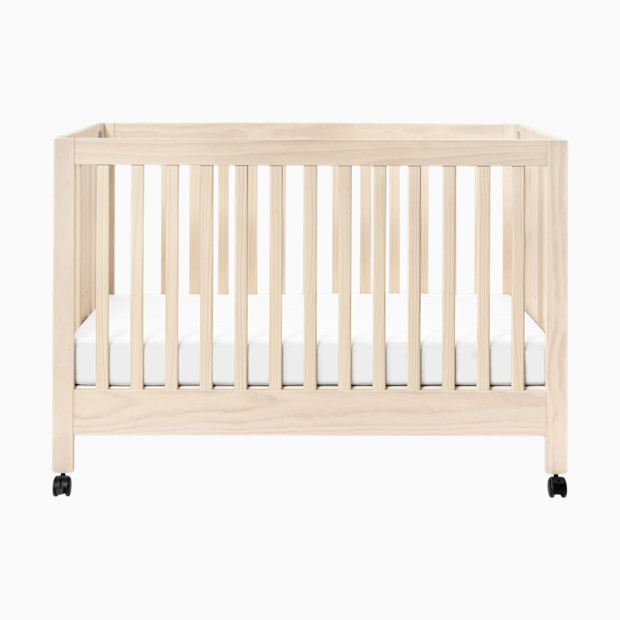 babyletto Maki Portable Folding Crib with Toddler Bed Conversion Kit.