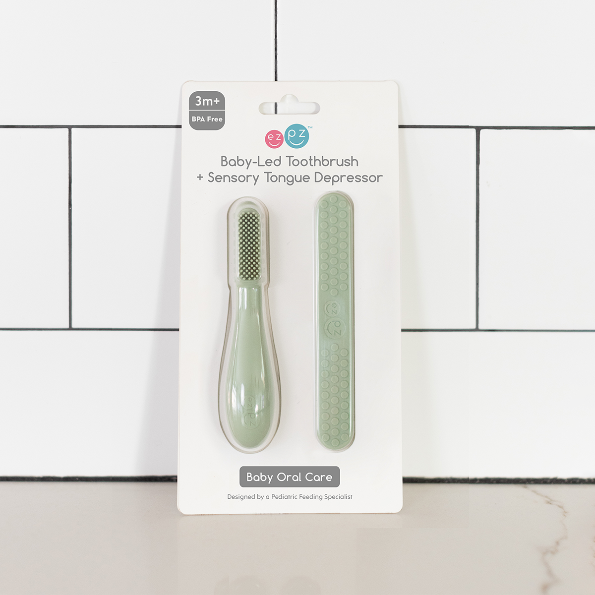 ezpz Baby-Led Toothbrush + Sensory Tongue Depressor Dual Pack - Sage.