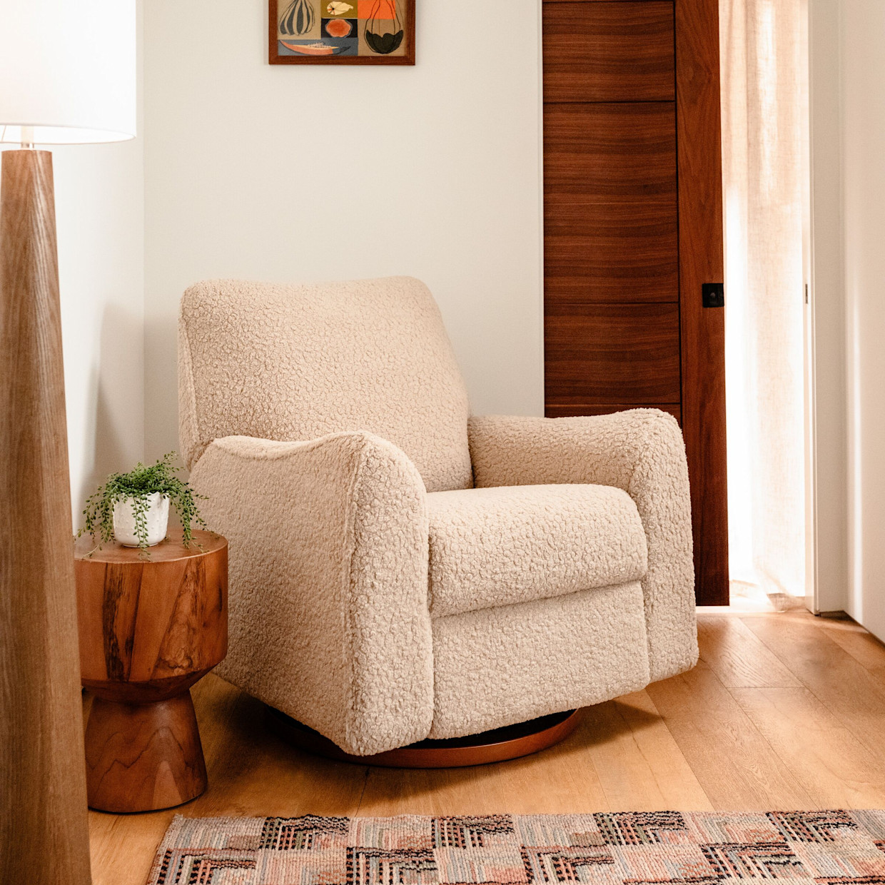 Nursery Works Sunday Power Recliner and Swivel Glider - Chai Shearling With Dark Wood Base.
