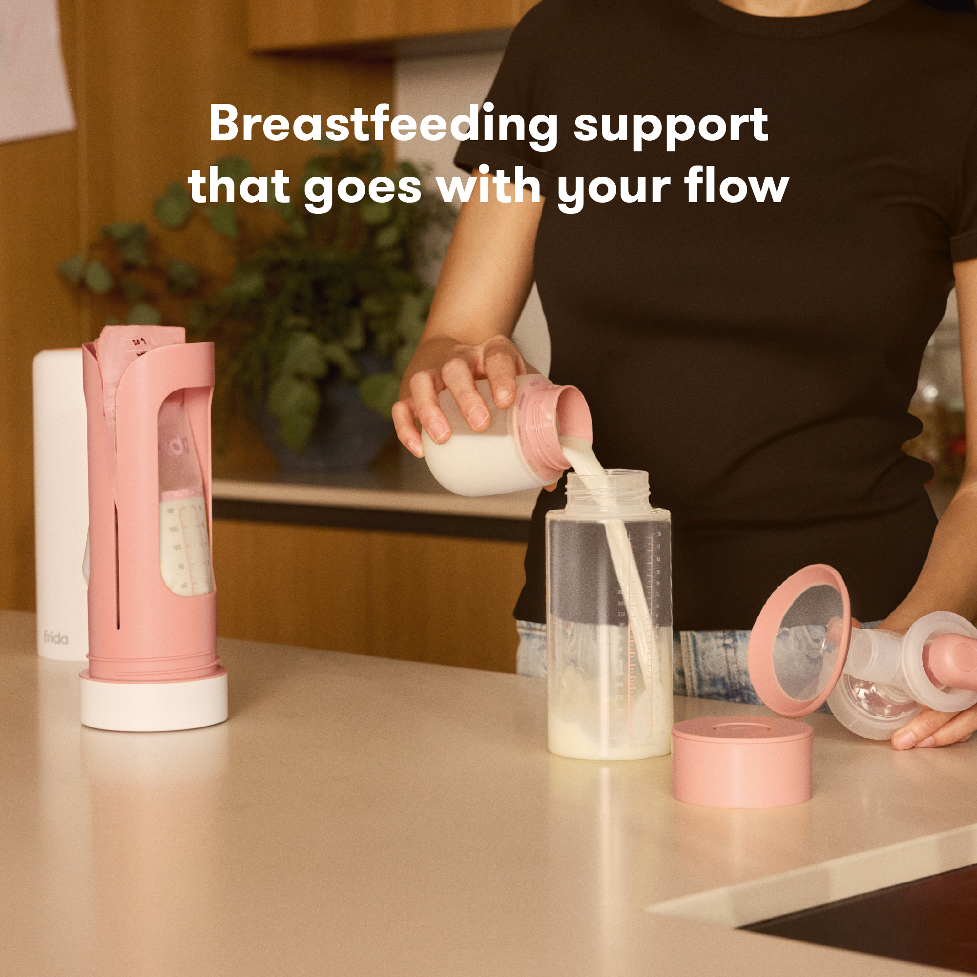 Frida Mom Flow + Go Breastmilk Cooler.