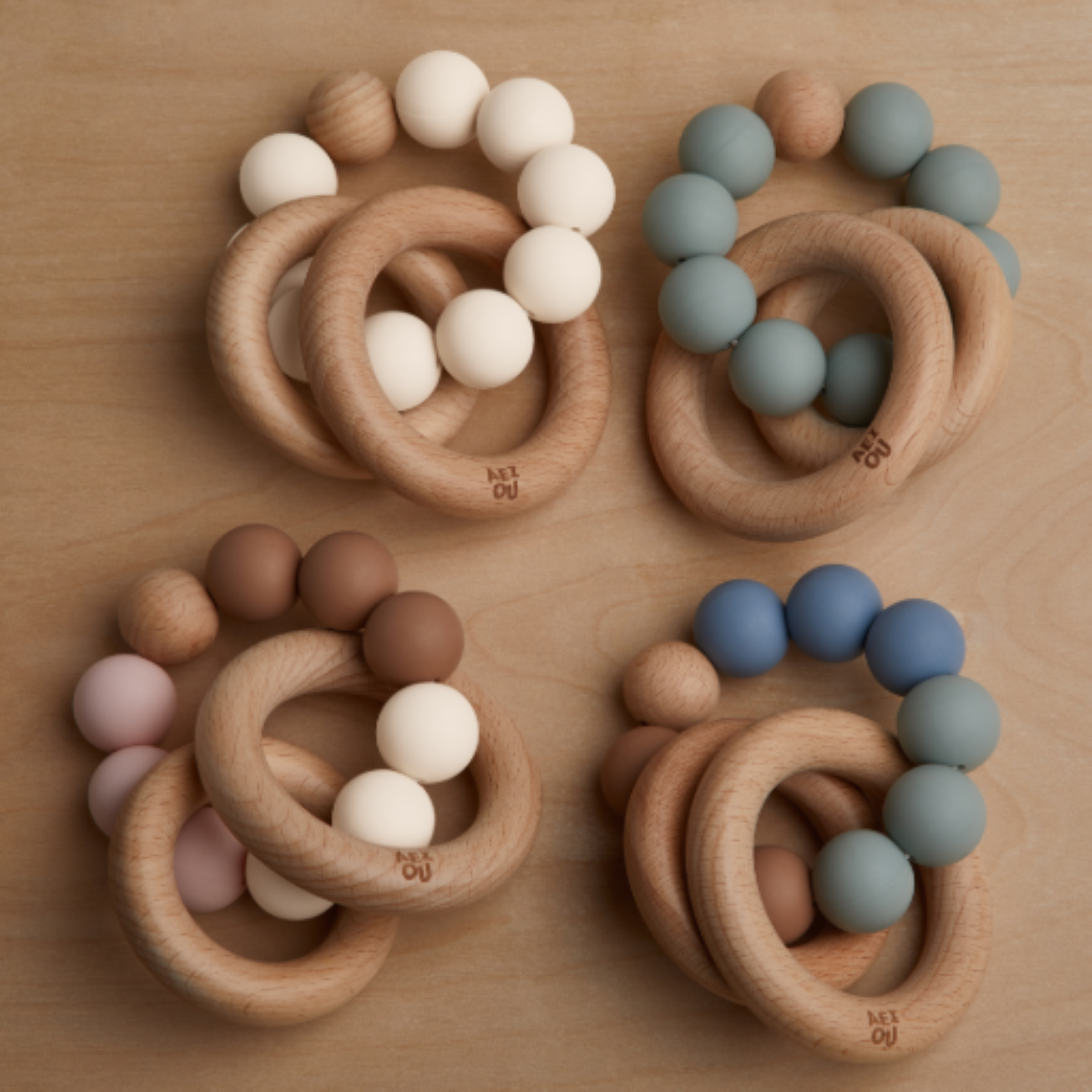 AEIOU Silicone & Wood Multi-Ring Teether - Petal Multi.