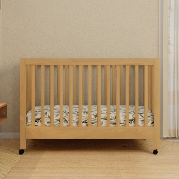 babyletto Maki Portable Folding Crib with Toddler Bed Conversion Kit.