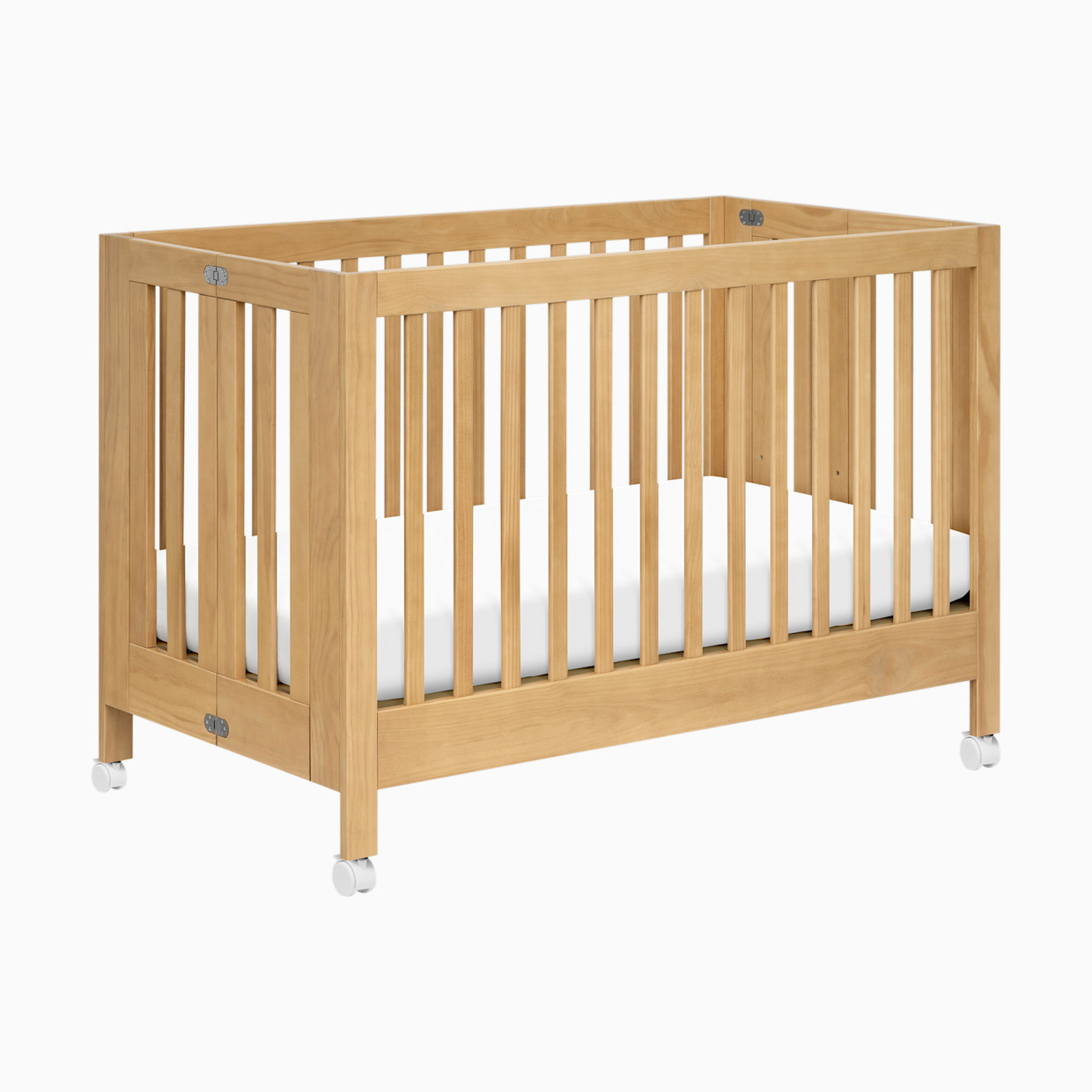 babyletto Maki Portable Folding Crib with Toddler Bed Conversion Kit - Honey.