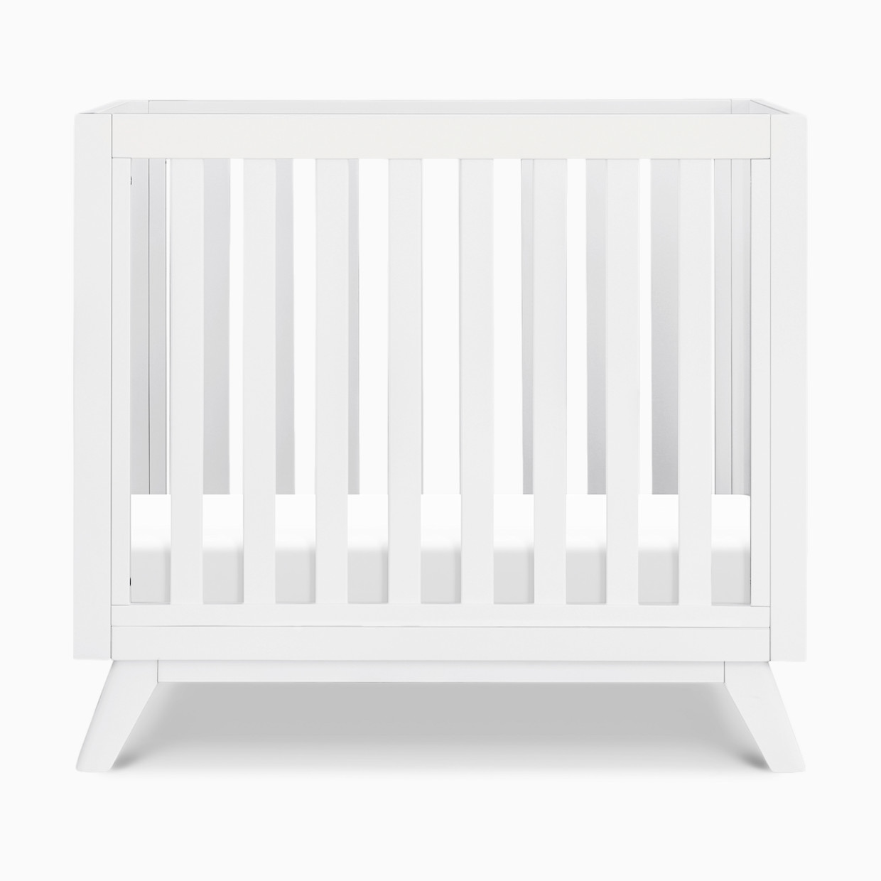 daVinci Otto 3-in-1 Convertible Mini Crib with 4" Mattress - White.