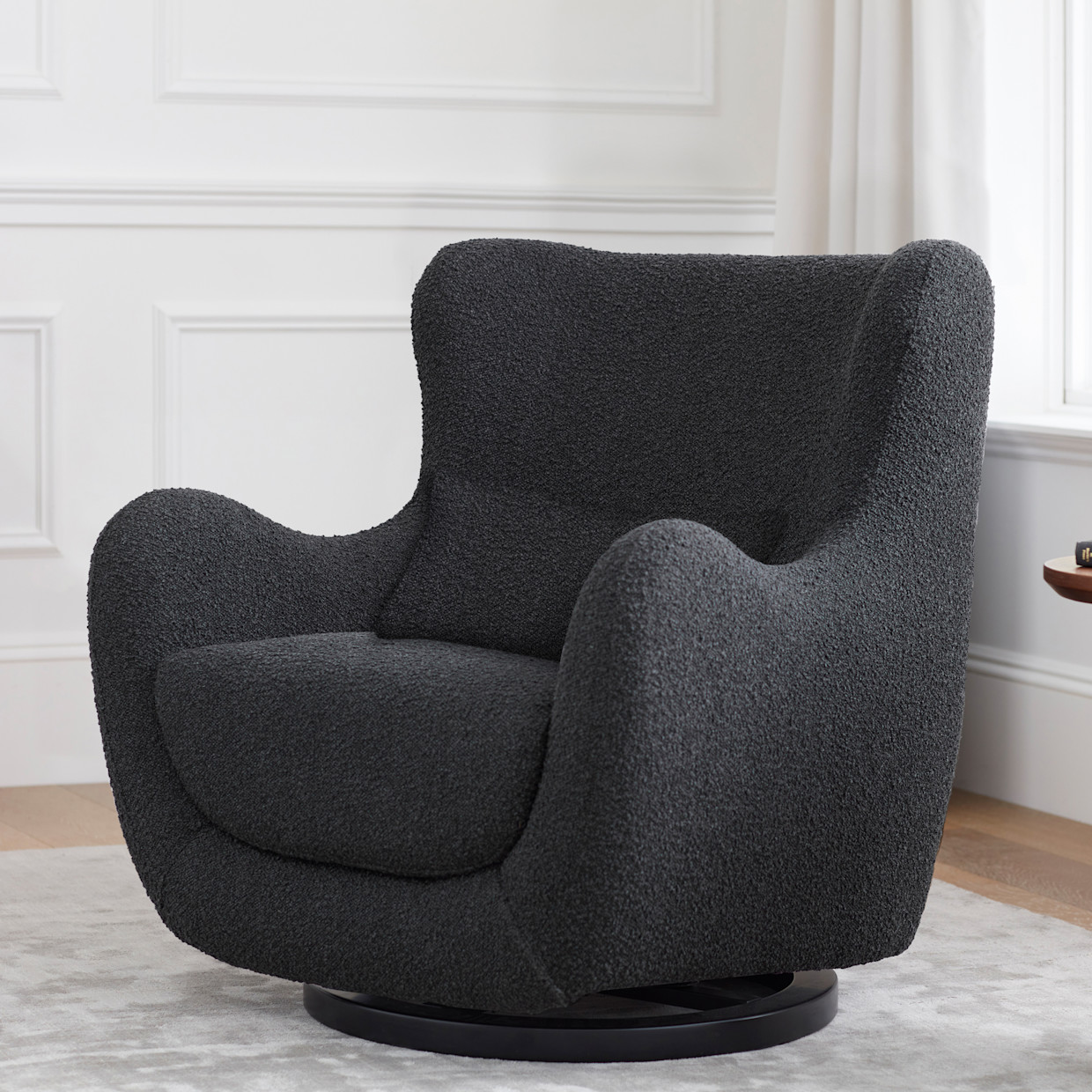 Nursery Works Solstice Swivel Glider - Black Boucle With Black Wood Base.
