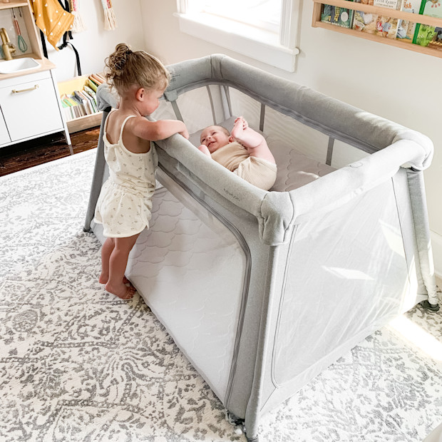 Newton Baby Deluxe Travel Crib & Play Yard + Bassinet Insert.