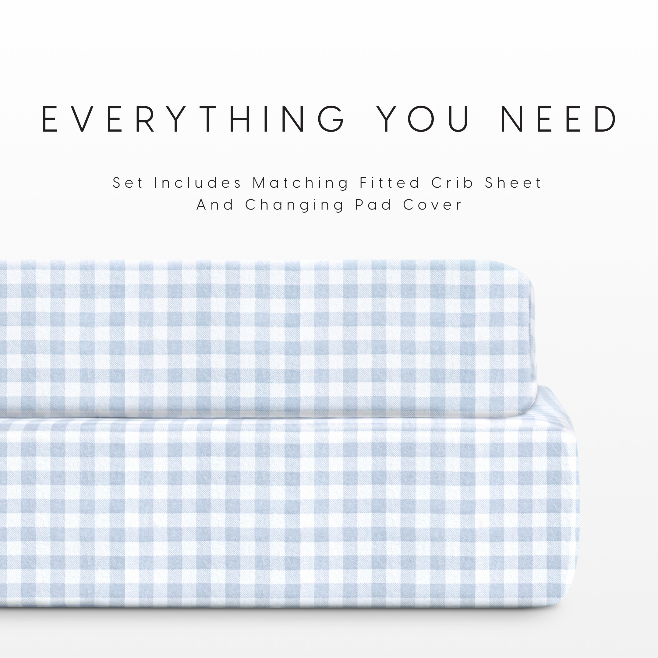 Set of blue gingham crib sheet and changing pad cover.
