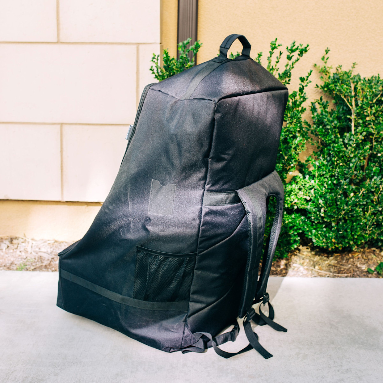 Sprucely Padded Backpack Car Seat Travel Bag - Black.