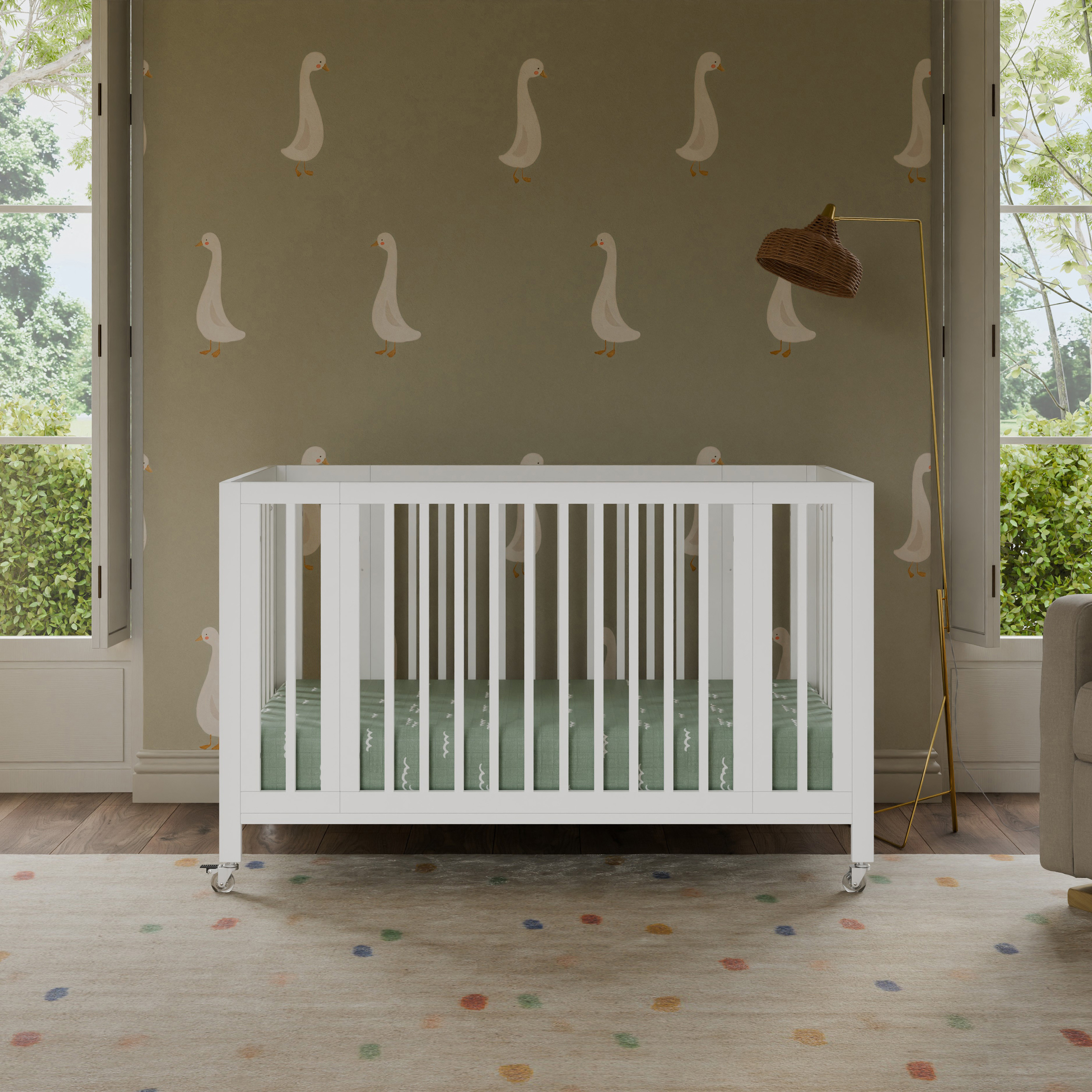 babyletto Rolli 9-in-1 Convertible All-Stages Crib with Bassinet & Toddler Bed Conversion Kits.
