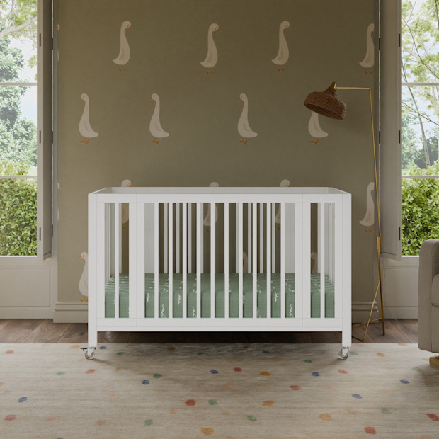 babyletto Rolli 9-in-1 Convertible All-Stages Crib with Bassinet & Toddler Bed Conversion Kits.