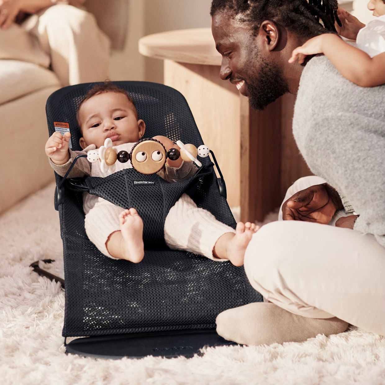 BabyBjörn Bouncer Bliss and Toy Bar Bundle - Dark Green/Bw Googly Eyes.