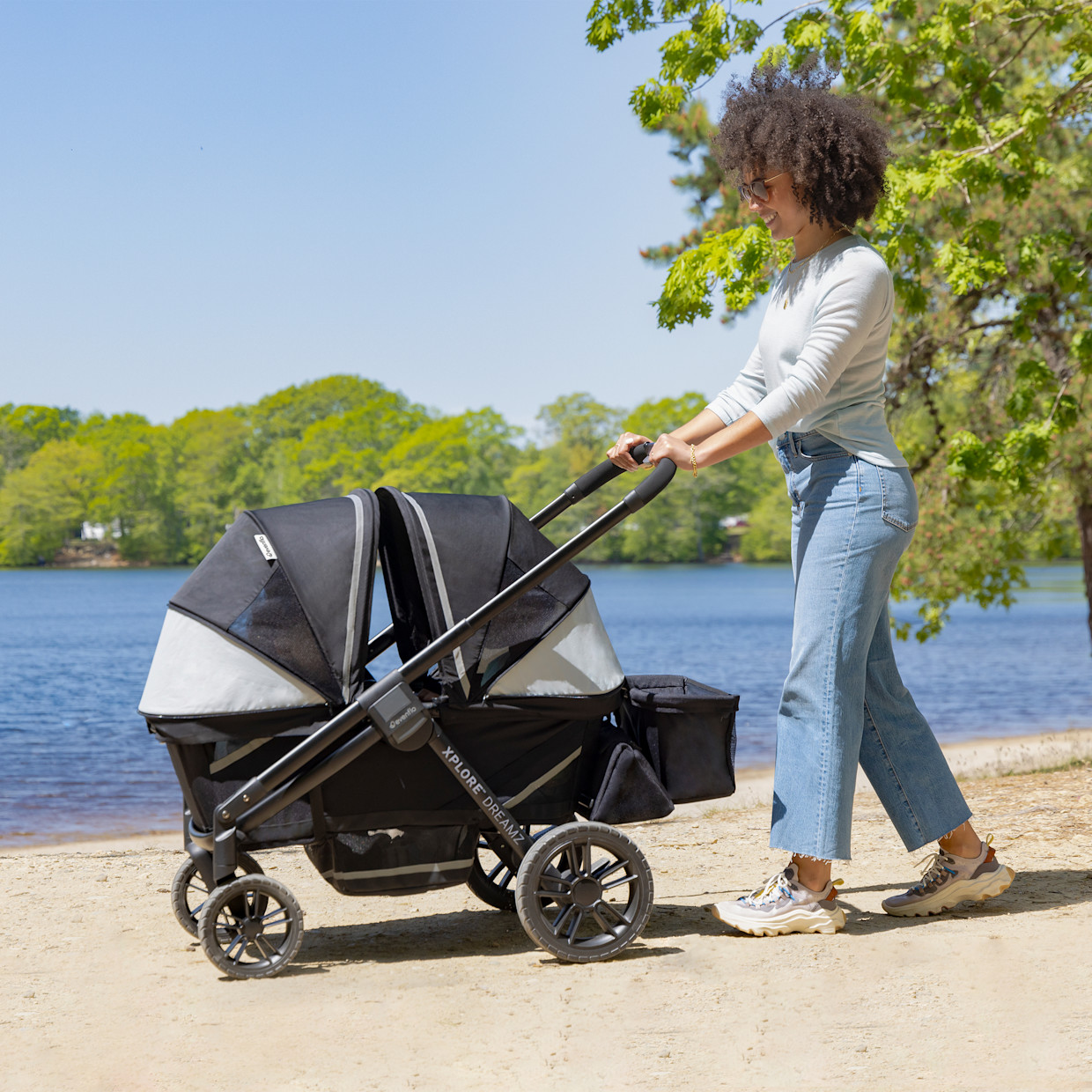 Evenflo Pivot Xplore Dreamz All-Terrain Stroller Wagon with Bassinet Insert - Jetsetter Black.