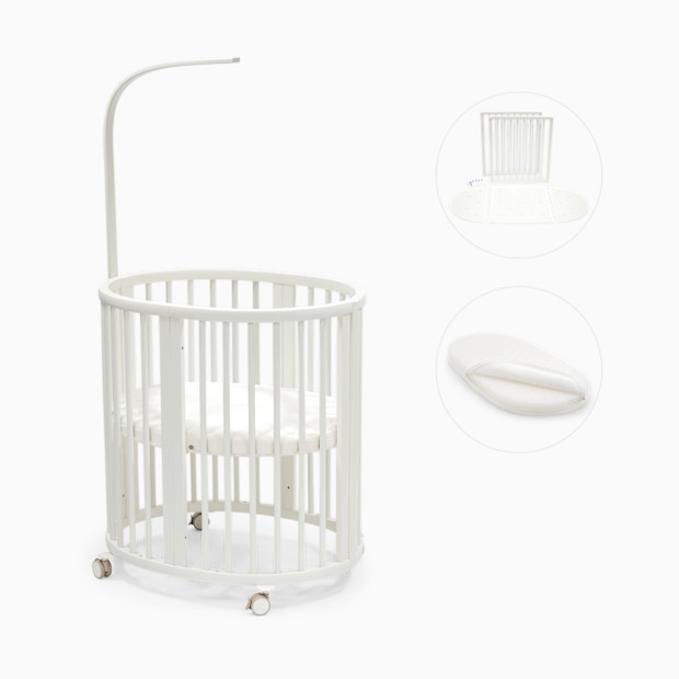 Stokke Sleepi3-in-1 Convertible Crib with Mattresses and Extension Kit.
