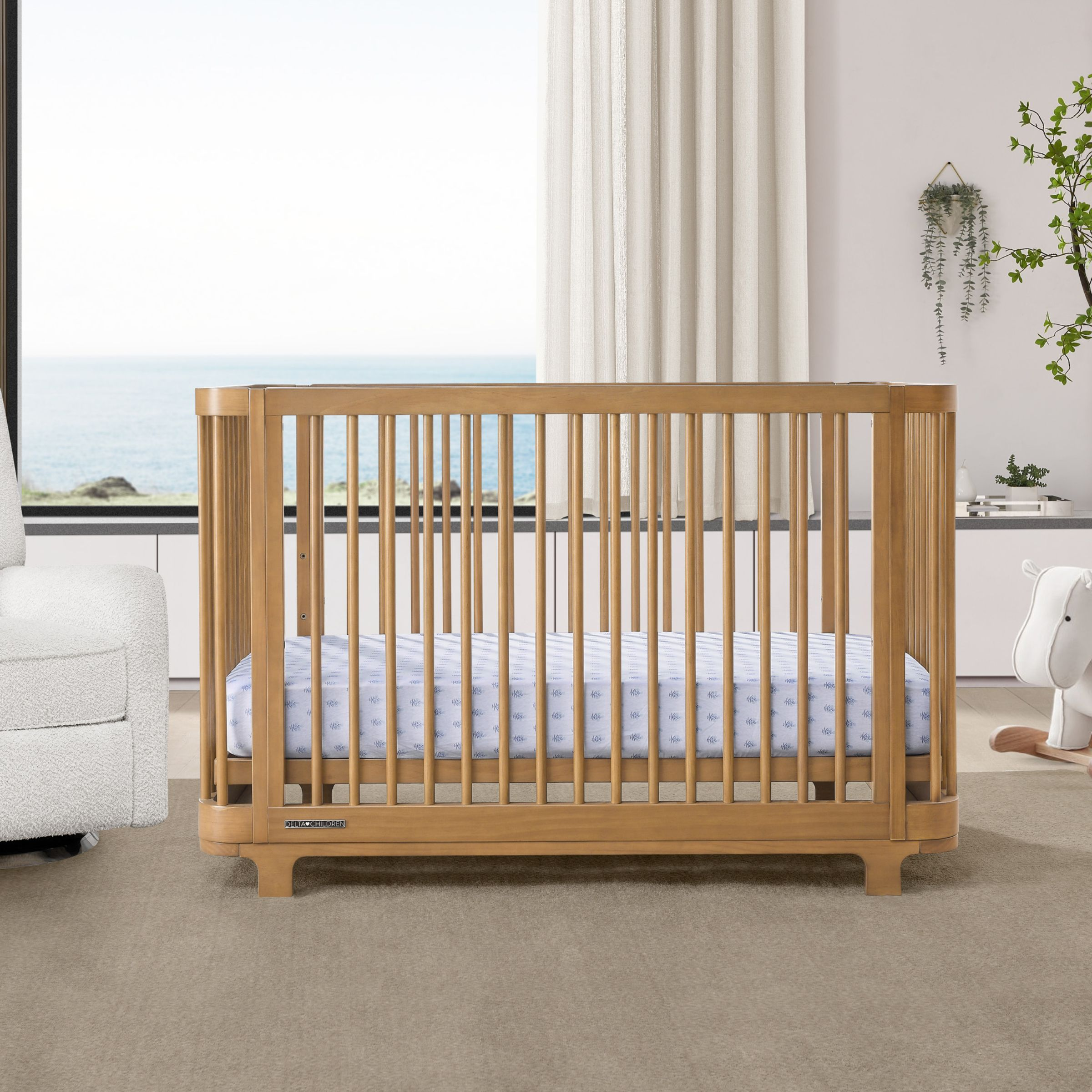 Delta Children Nest 4-in-1 Convertible Crib - Acorn.
