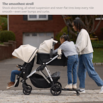Family with stroller showing smooth ride features
