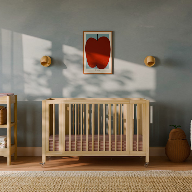 babyletto Rolli 9-in-1 Convertible All-Stages Crib with Bassinet & Toddler Bed Conversion Kits.