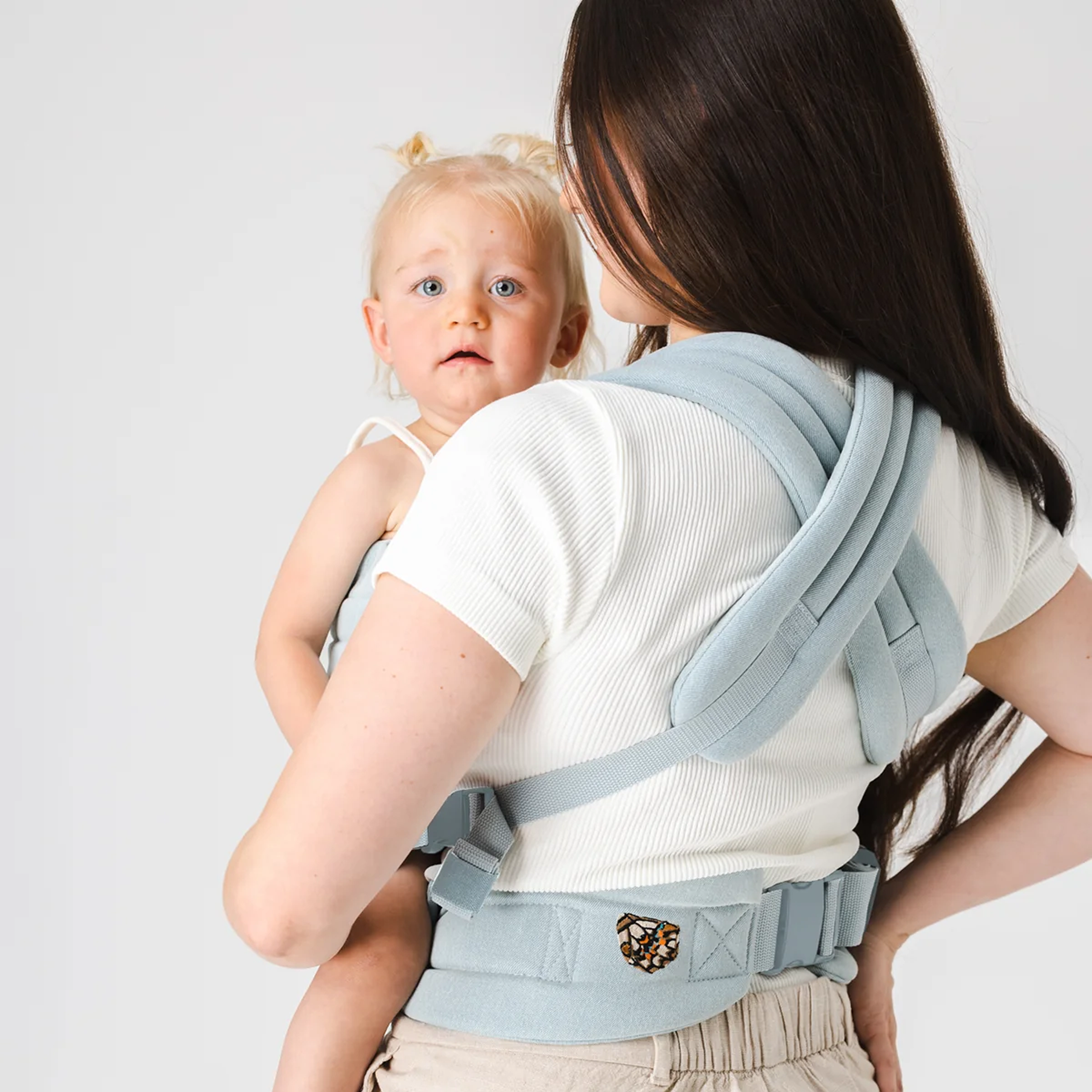 MABĒ The Monarch Buckle Baby Carrier - Dream Wash Denim.