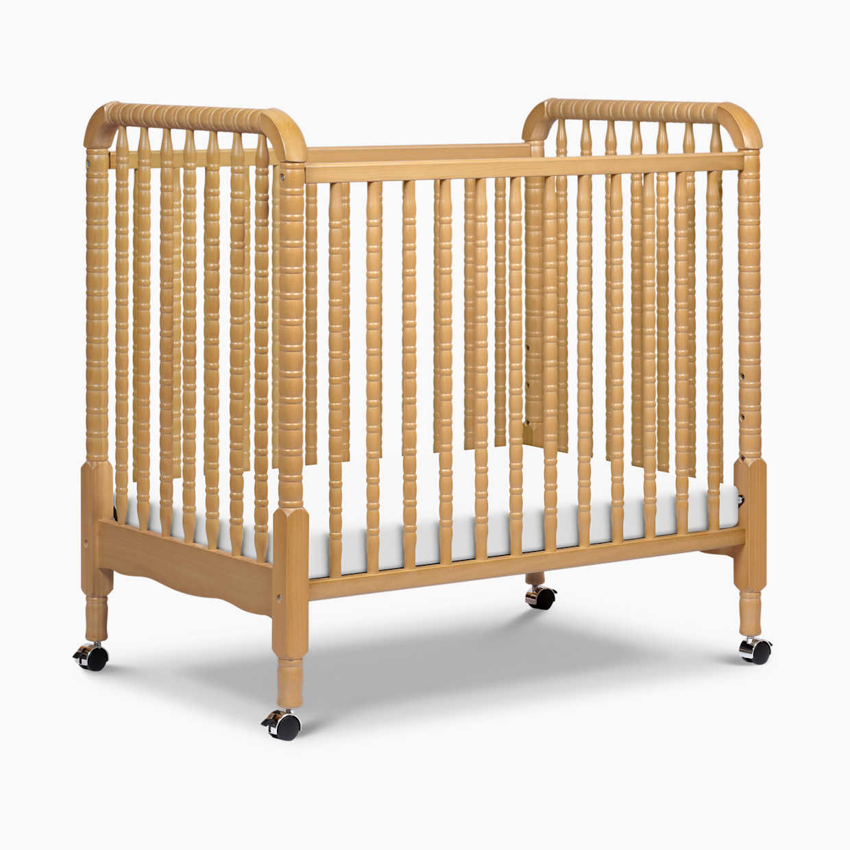 daVinci Jenny Lind 3-in-1 Convertible Mini Crib - Honey.