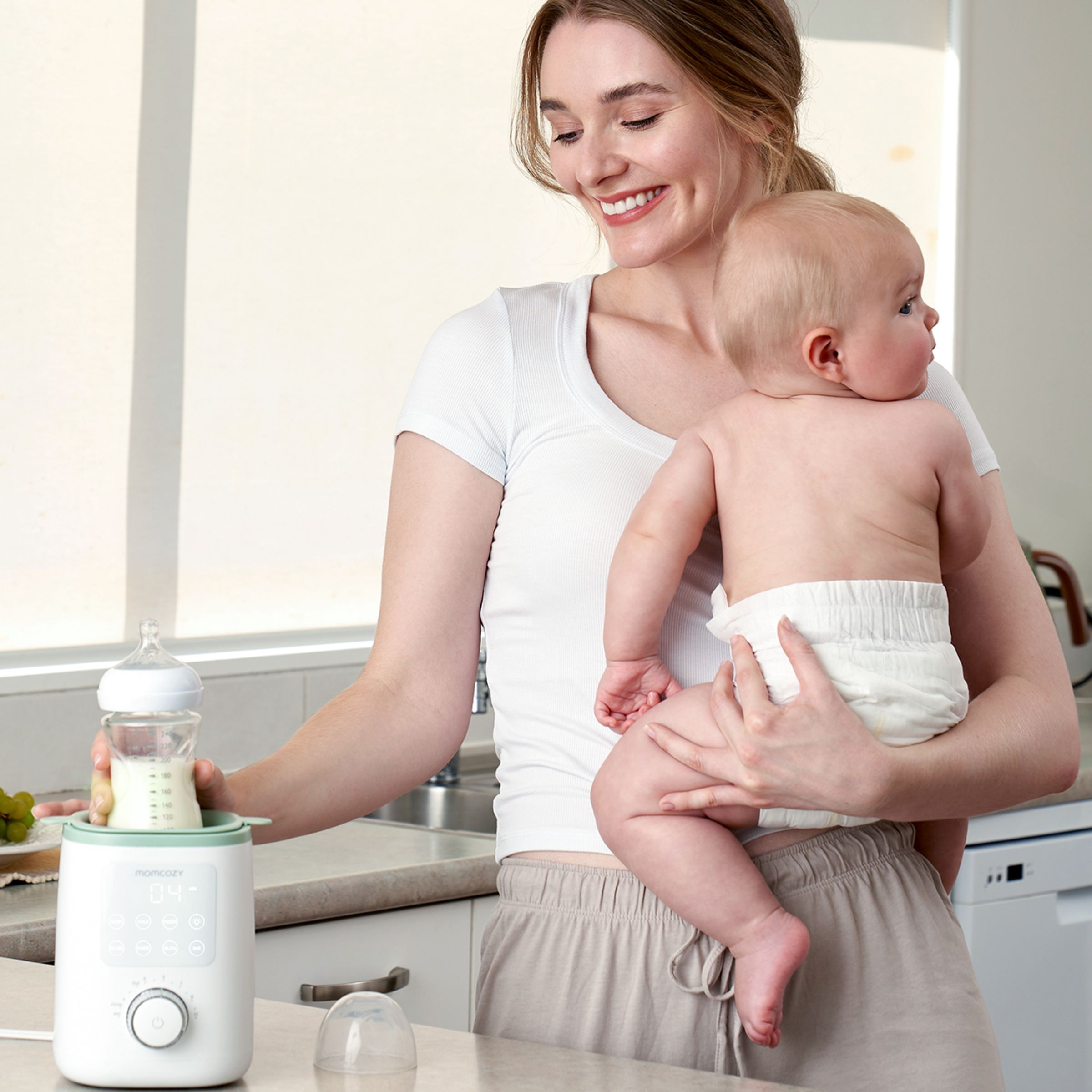 Momcozy 9-in-1 Nutri Bottle Warmer.
