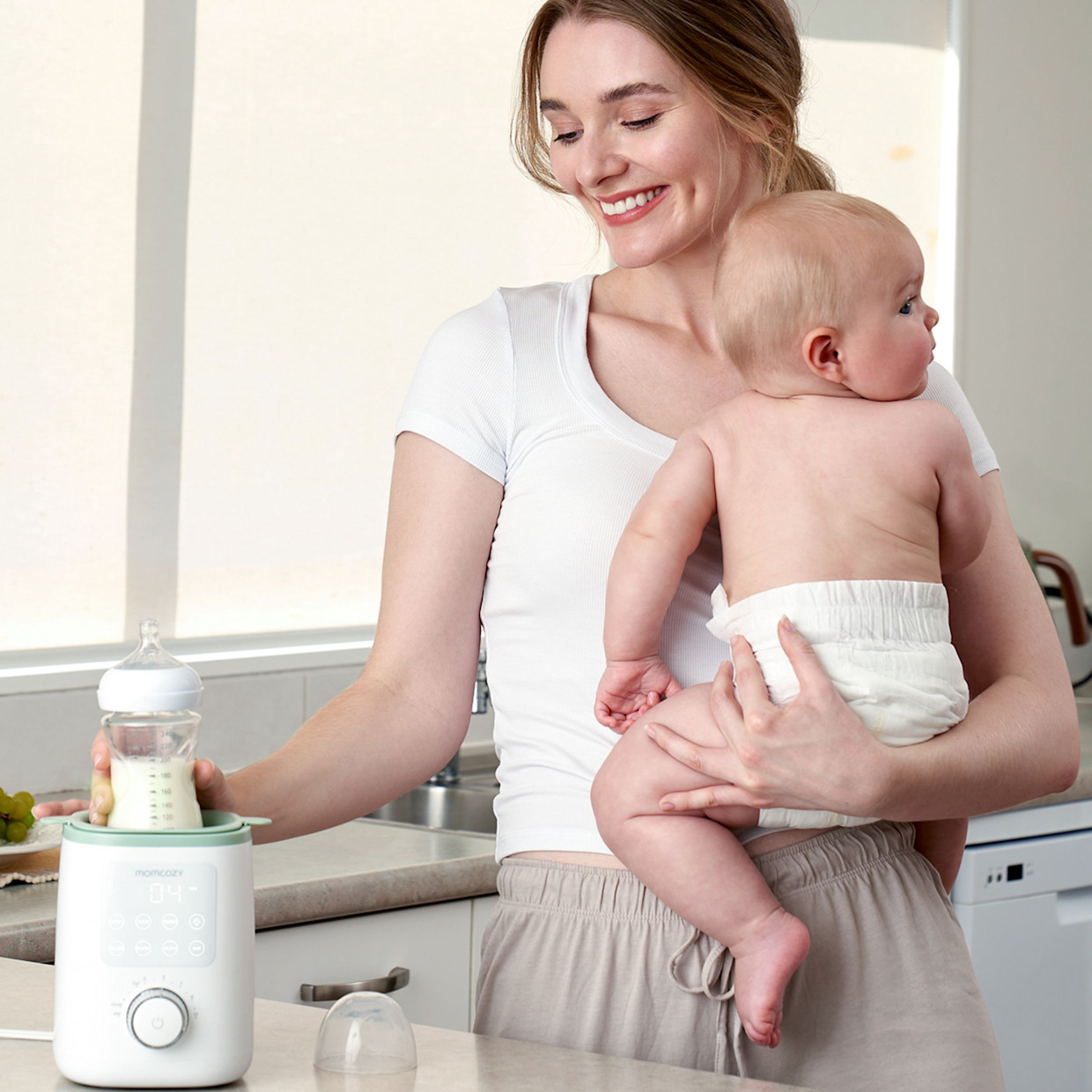 Momcozy 9-in-1 Nutri Bottle Warmer.
