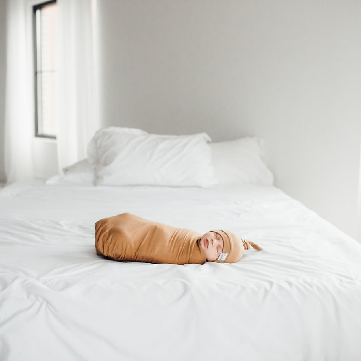 Copper Pearl Top Knot Hat.