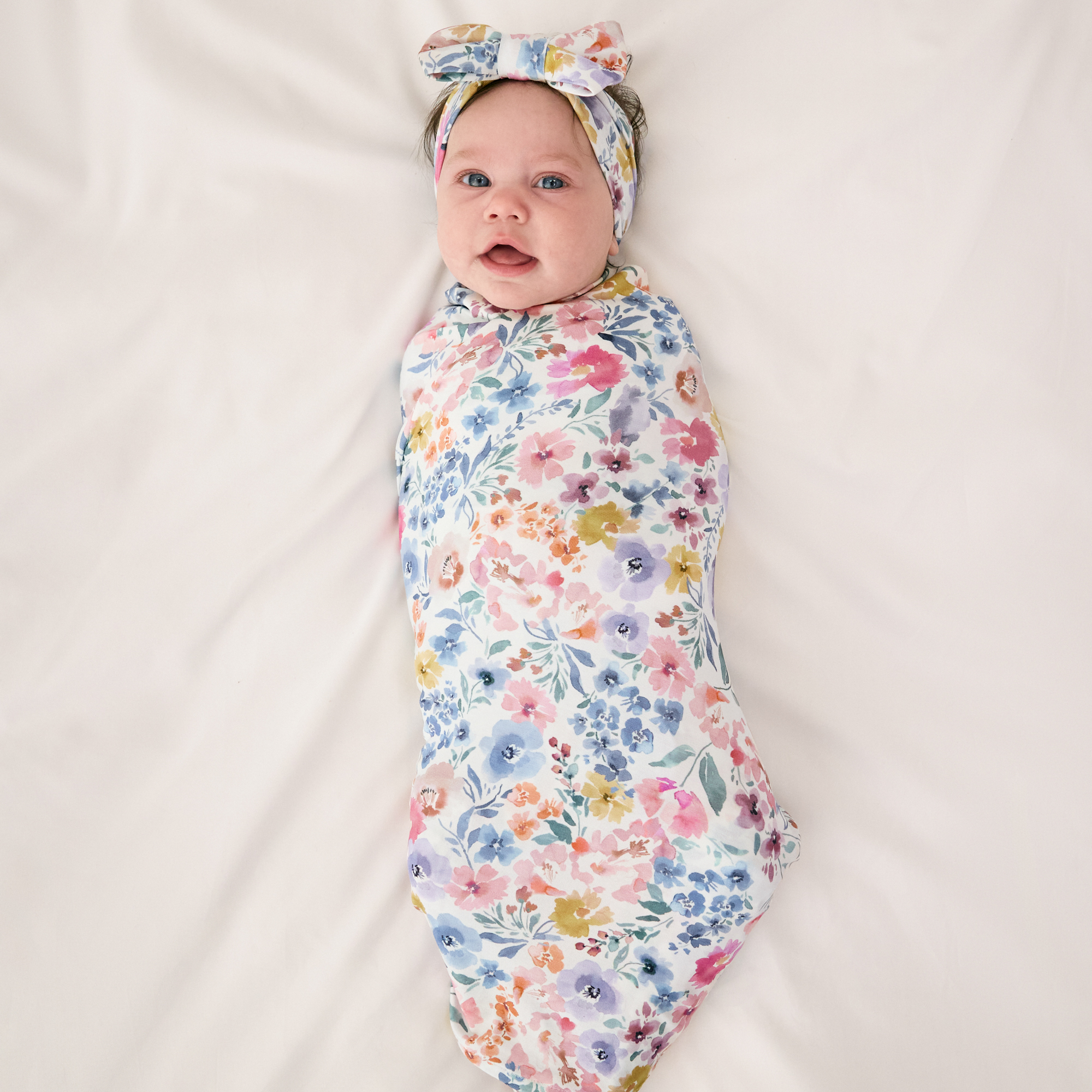 Little Sleepies Swaddle & Luxe Bow Headband Set - Tiny Blooms, One Size.