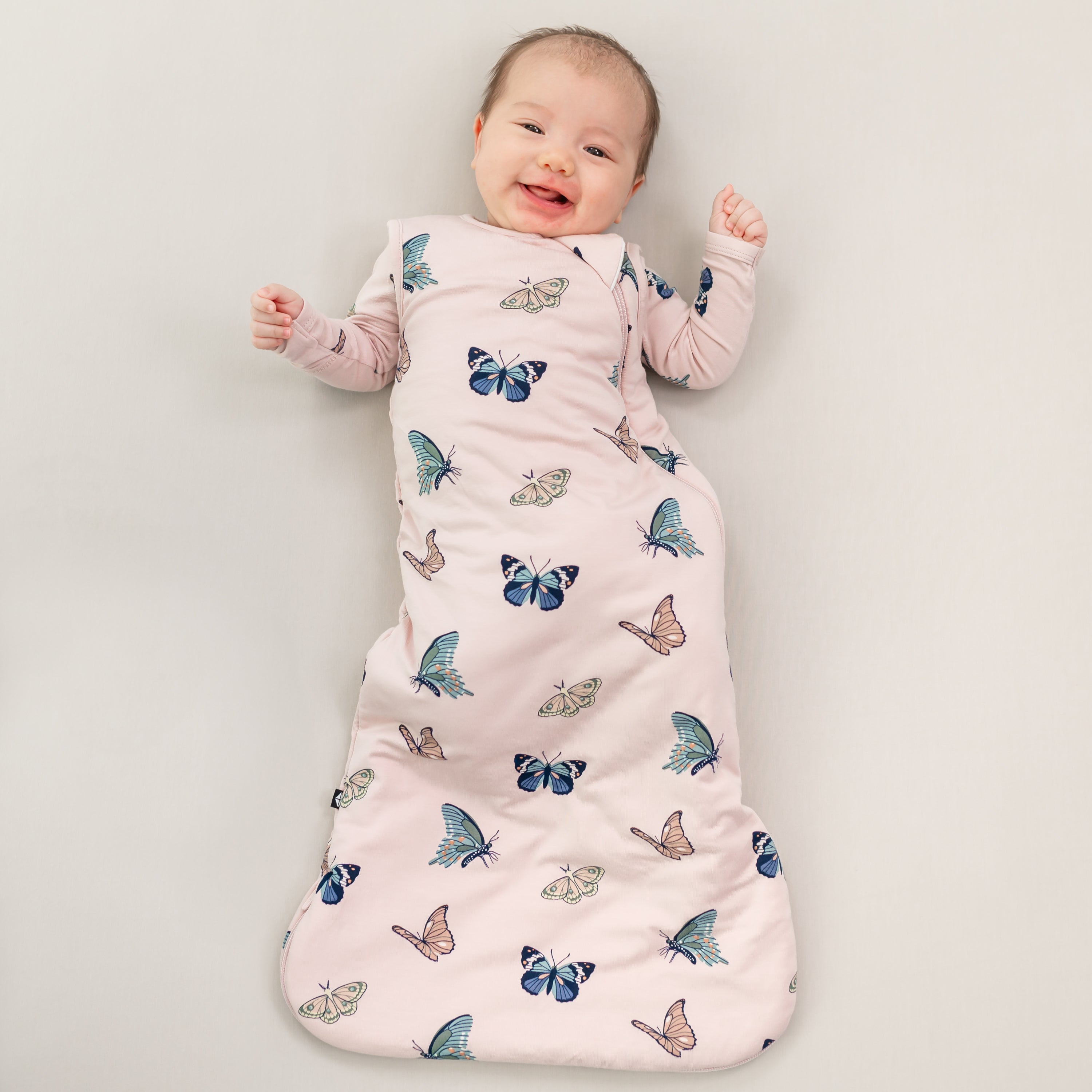 Kyte Baby Printed 1.0 TOG Sleep Bag - Blush Butterfly, Medium.