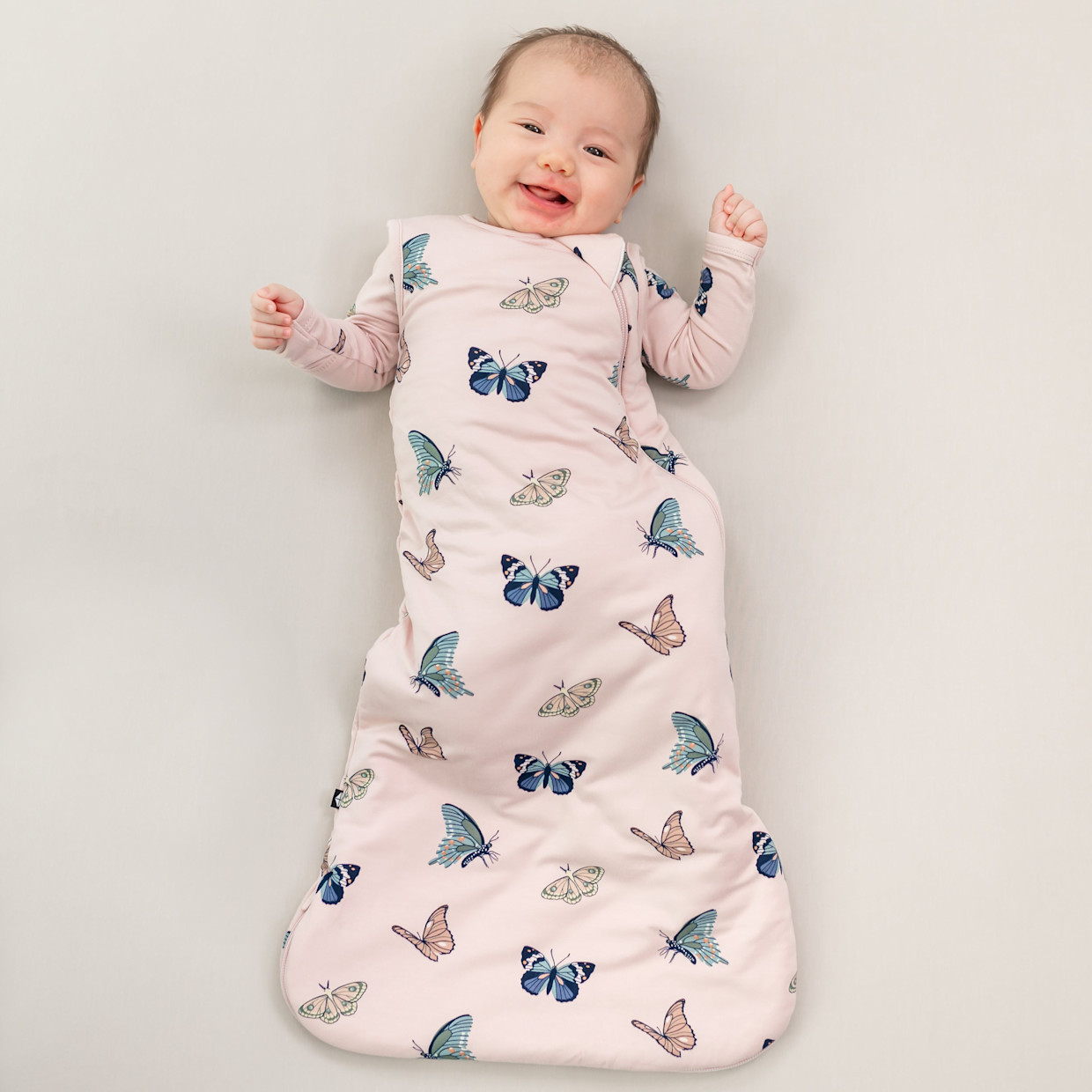 Kyte Baby Printed 1.0 TOG Sleep Bag - Blush Butterfly, Small.