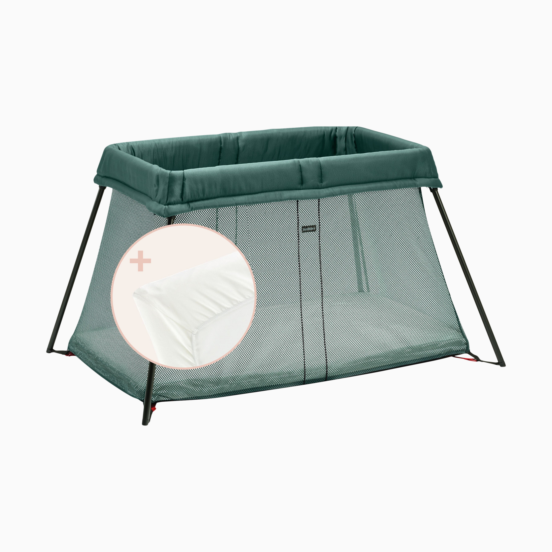 Teal travel crib with mesh side and fabric cover on a plain background.