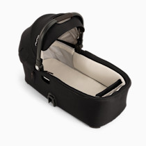 Interior view of the Nuna DEMI bassinet liner and padding.
