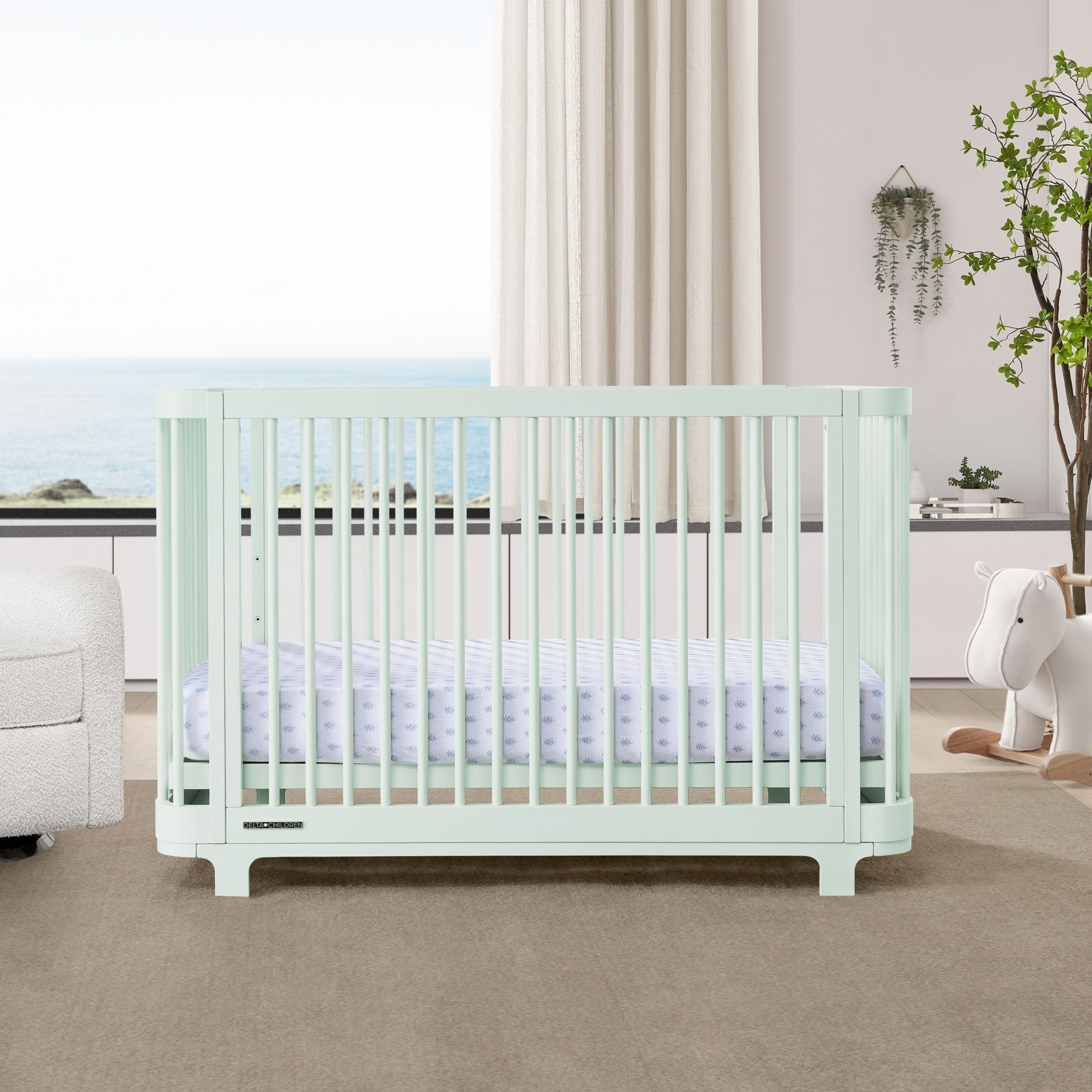 Delta Children Nest 4-in-1 Convertible Crib - Light Sage.