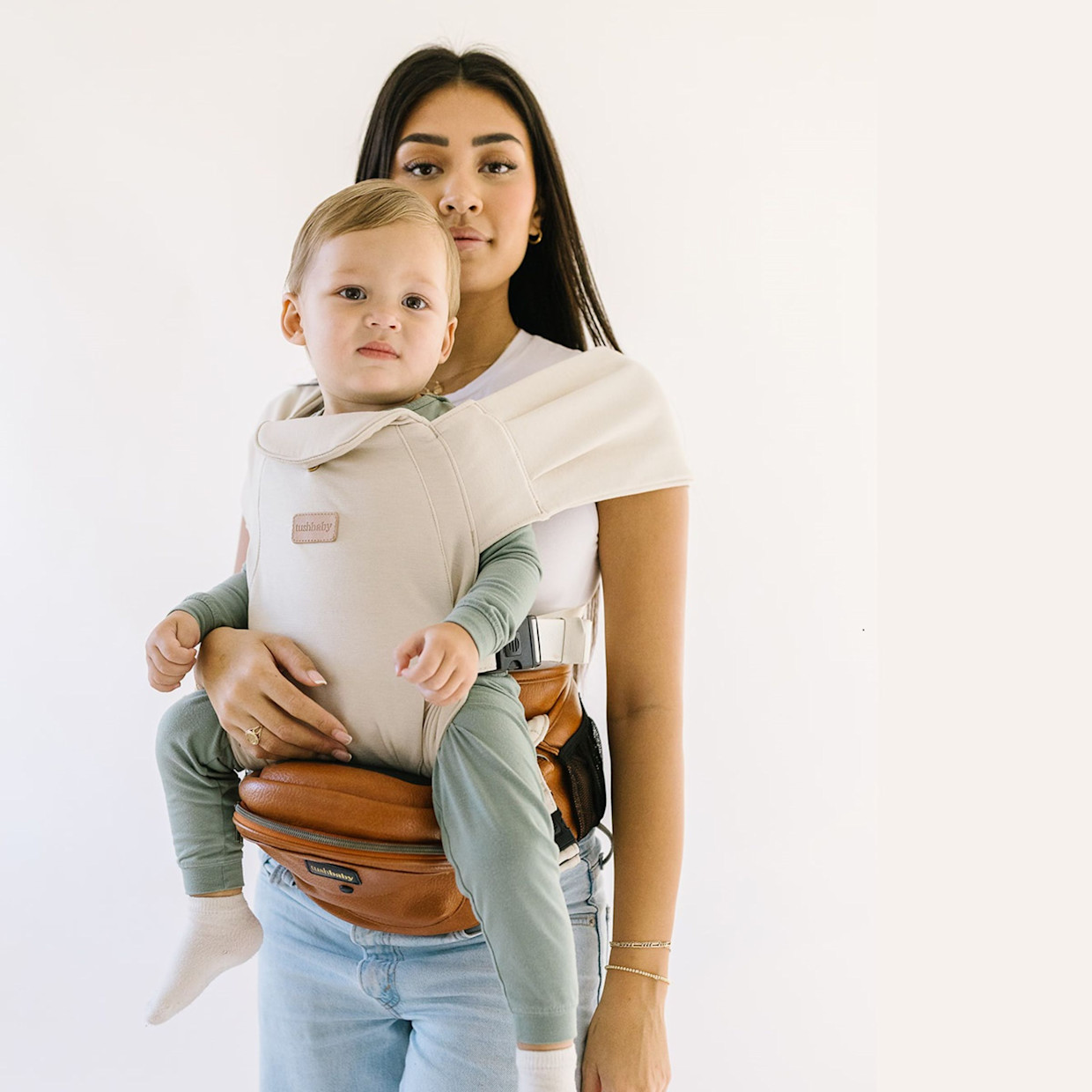 Tushbaby Hip Seat and Snug Carrier 2-in-1 Bundle - Cognac Vegan Leather, Cream Snug Carrier.