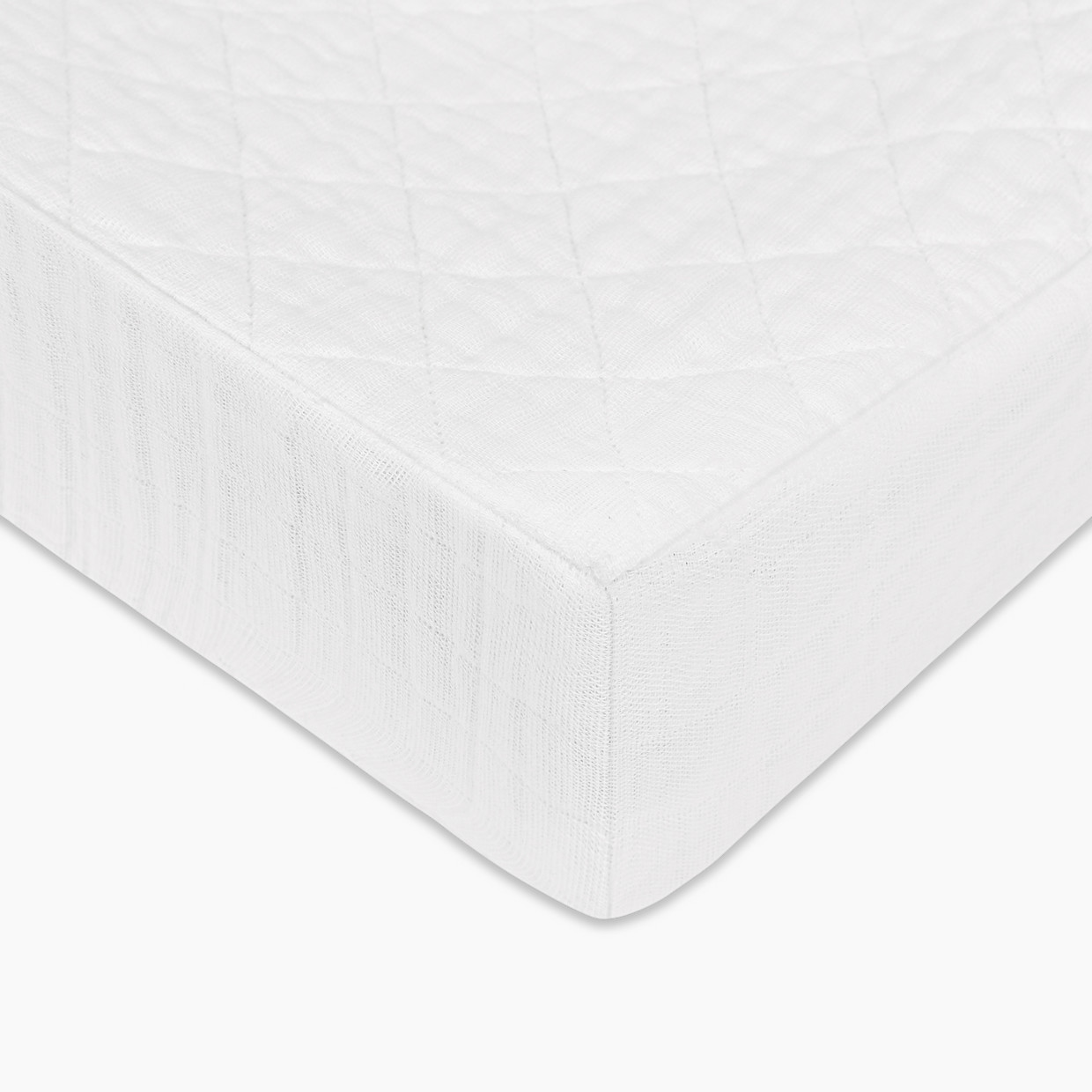 babyletto Quilted Changing Pad Cover in GOTS Certified Organic Muslin Cotton - White.