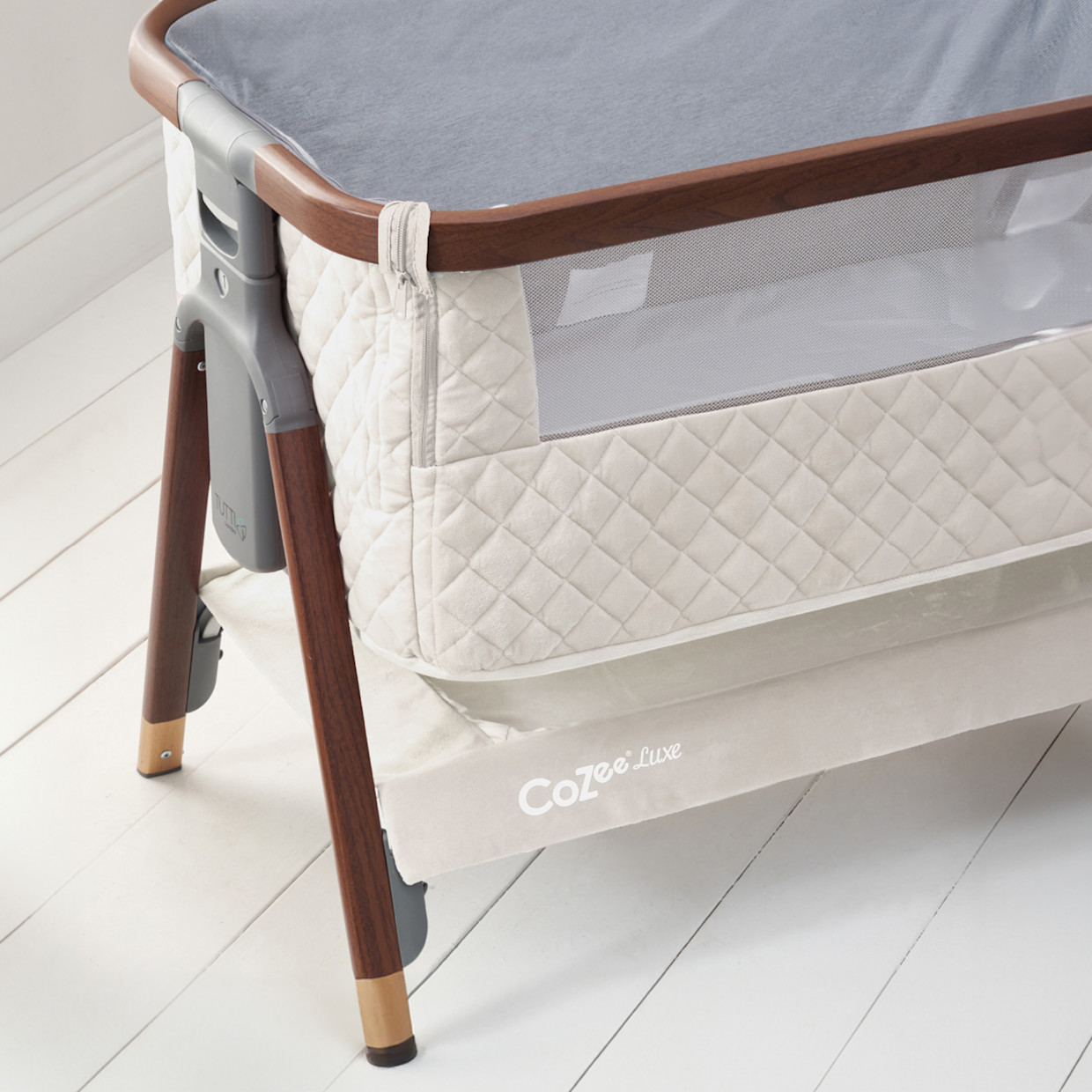Tutti Bambini CoZee Luxe Bedside Crib - Walnut/Cream.