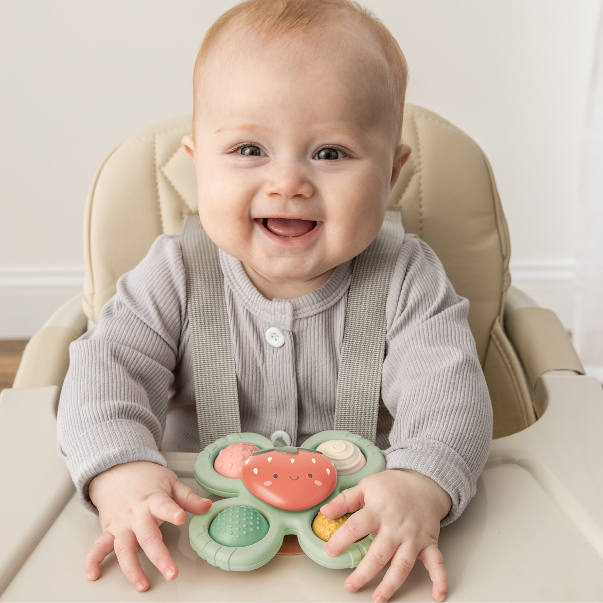 Itzy Ritzy High Chair, Bath & Travel Fidget Toy - Strawberry.