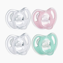 Tommee Tippee Ultra-Light Silicone Pacifier, 0-6 Months, Symmetrical One-Piece Design, BPA-Free Silicone Binkies, Clear/Green/Pink, Pack of 4